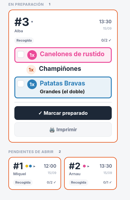 Modo Cocina de COMMANDA: tarjetas de pedidos en preparación y pendientes de abrir, con sus platos y el botón de marcar preparado